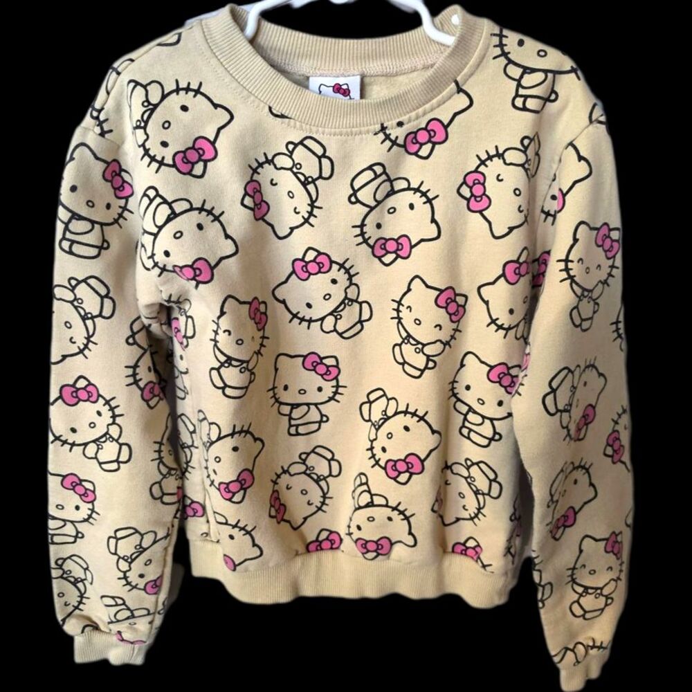 Girl's Sanrio Hello Kitty All Over Print Fleece Sweatshirt Tan Pink Bow L